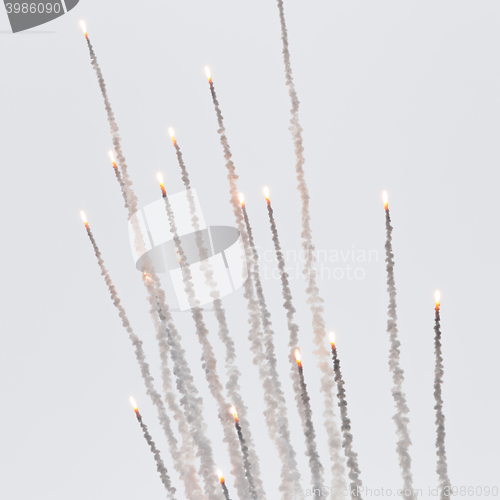 Image of Flares with a trial of smoke
