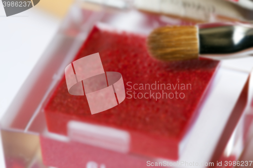 Image of red women\'s cosmetics