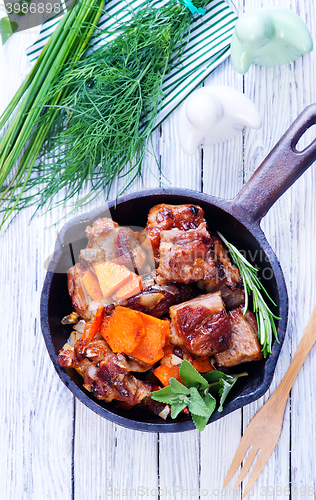 Image of fried meat with vegetables