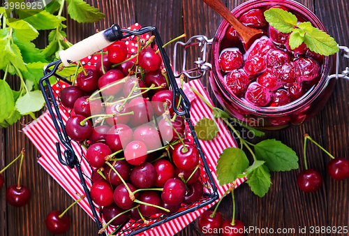 Image of cherry jam and berries