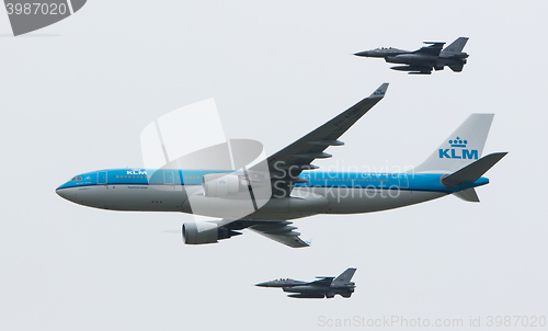 Image of LEEUWARDEN, NETHERLANDS - JUNE 11 2016: Dutch KLM Boeing escorte