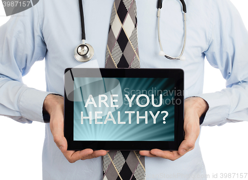 Image of Doctor holding tablet - Are you healthy?