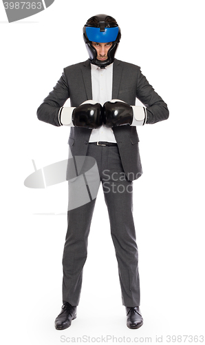 Image of Businessman in boxing gloves 