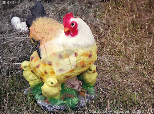 Image of Sculptured figure of a hen with chickens