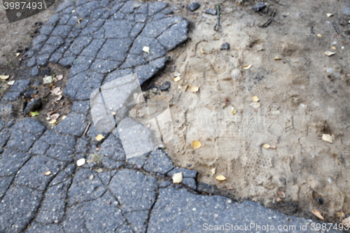 Image of the broken asphalt