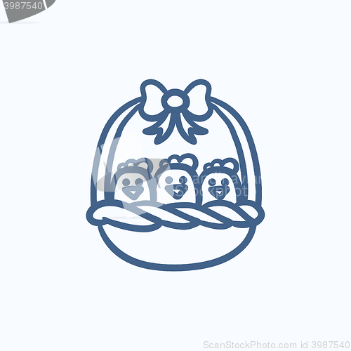 Image of Basket full of easter chicks sketch icon.
