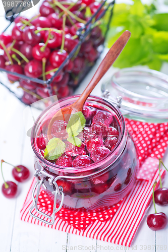 Image of cherry jam and berries