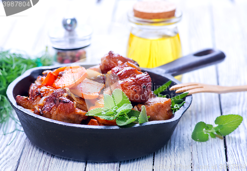 Image of fried meat with vegetables