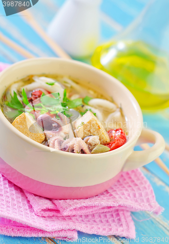 Image of soup with noodles and seafood