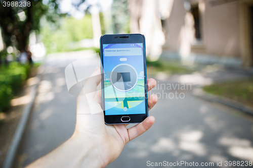 Image of Moscow, Russia - August, 02: Android user play in Pokemon Go augmented reality mobile game on smartphone.