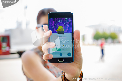 Image of Moscow, Russia - August, 02: Android user play in Pokemon Go augmented reality mobile game on smartphone.