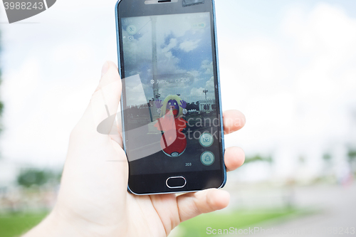 Image of Roseville, CA/USA - July 11: An Android user reads the warning s