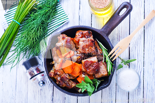 Image of fried meat with vegetables