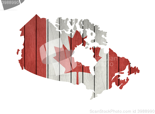 Image of Map With Wooden Flag Of Canada