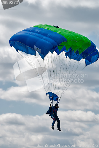 Image of Paratrooper woman descends