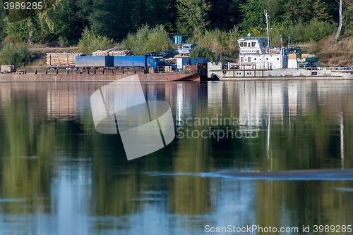 Image of Vehicle ferry cross Vyatka River. Russia