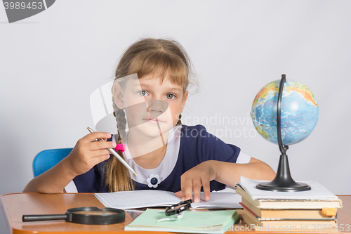 Image of Schoolgirl on geography lesson