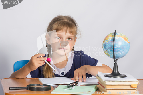 Image of Schoolgirl on geography lesson