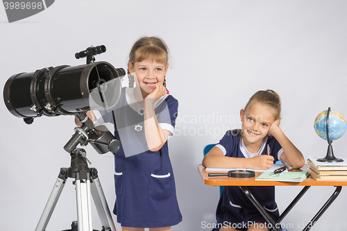 Image of Two girls mysteriously astronomers thinking