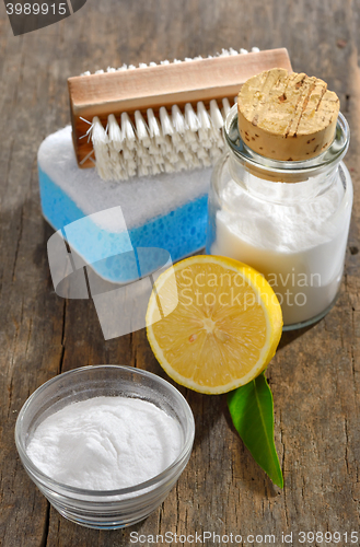 Image of Baking soda, lemon, sponge for cleaning