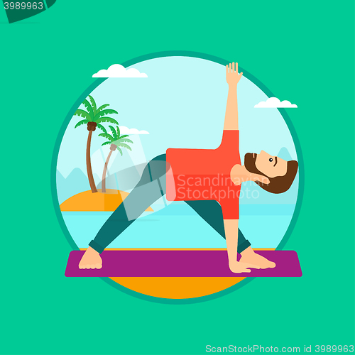 Image of Man practicing yoga triangle pose on the beach.