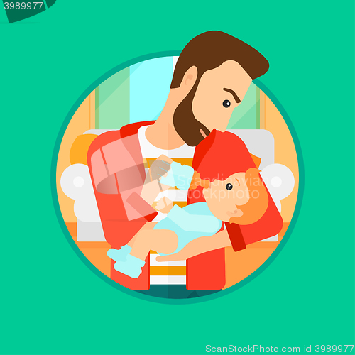 Image of Father feeding baby.