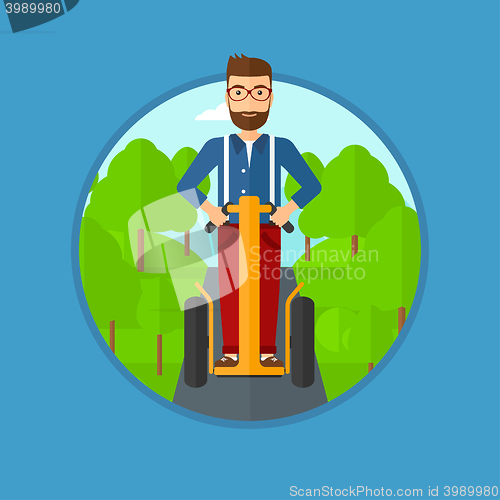 Image of Man driving electric scooter.