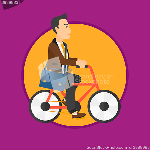 Image of Man riding bicycle.