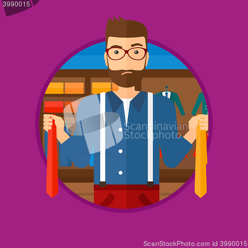 Image of Customer choosing necktie.