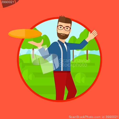 Image of Man playing flying disc.