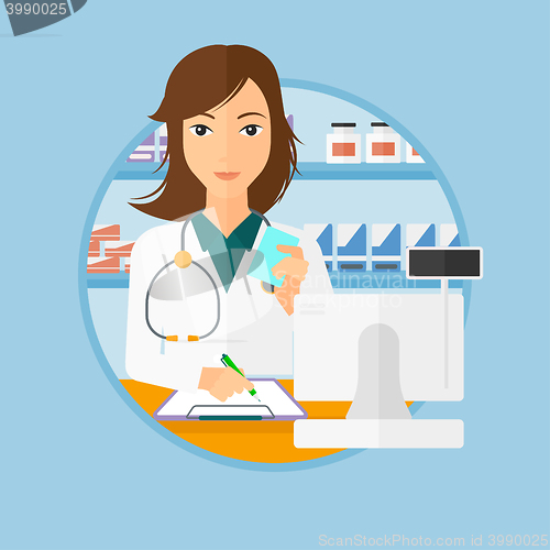 Image of Pharmacist writing prescription.