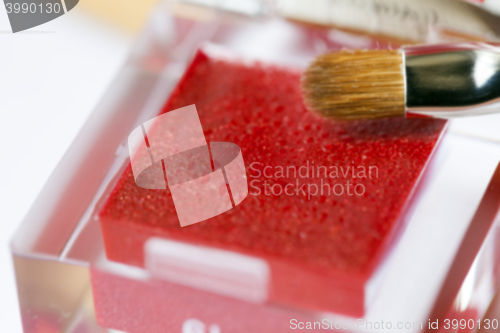 Image of red women\'s cosmetics