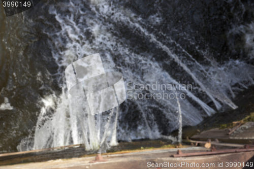 Image of old leaking dam