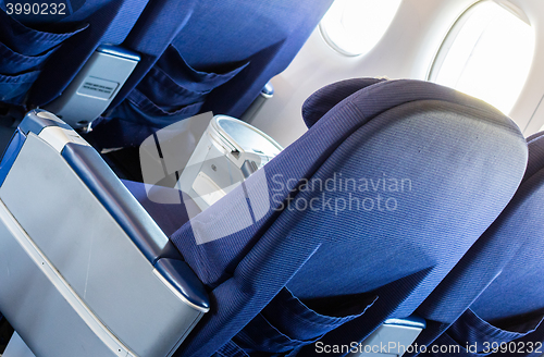 Image of Empty old airplane seats in the cabin, selective focus