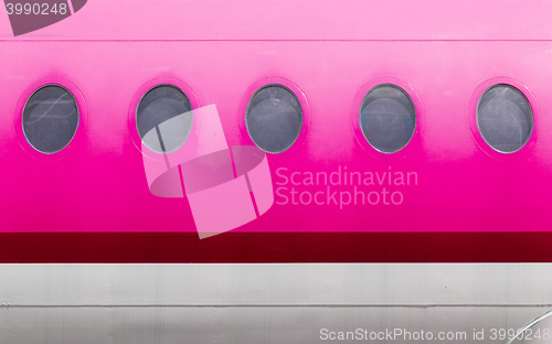 Image of Windows of the pink airplane