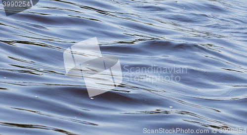 Image of Small waves on the water, perspective