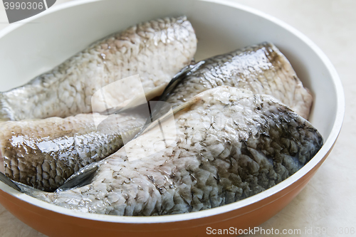 Image of Fish carp in the frying pan.