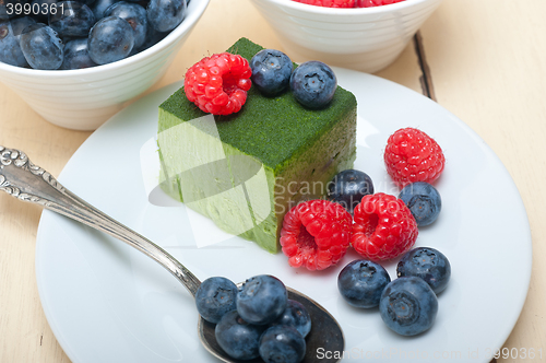 Image of green tea matcha mousse cake with berries