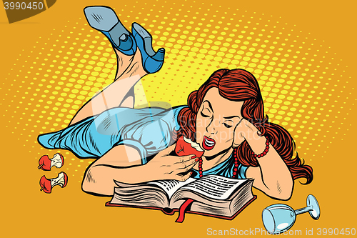 Image of Beautiful woman lying down reading a book and eating an Apple