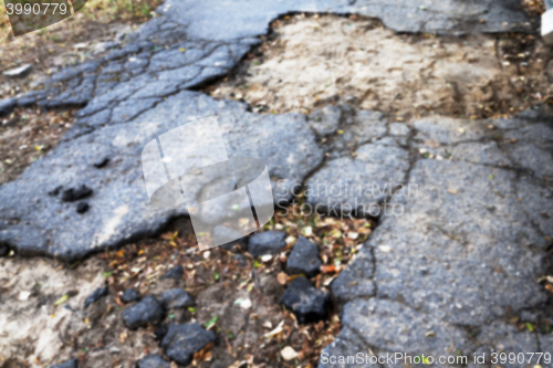 Image of the broken asphalt