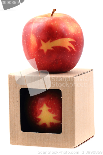 Image of apples with christmas symbols