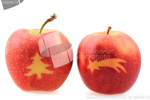 Image of apples with christmas symbols