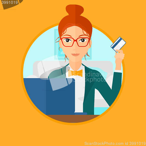 Image of Woman shopping online using her laptop.