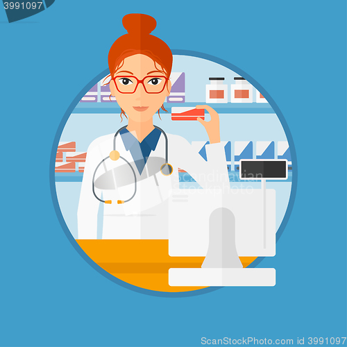 Image of Pharmacist showing some medicine.