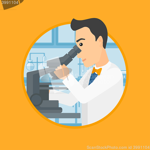 Image of Laboratory assistant with microscope.