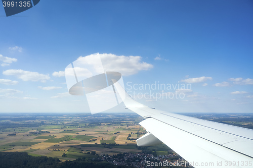 Image of view thru an airplane window