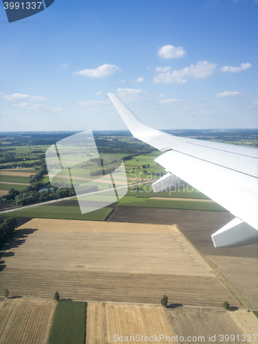 Image of view thru an airplane window