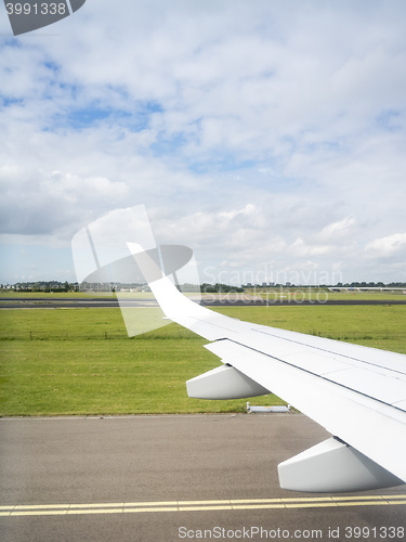 Image of view thru an airplane window