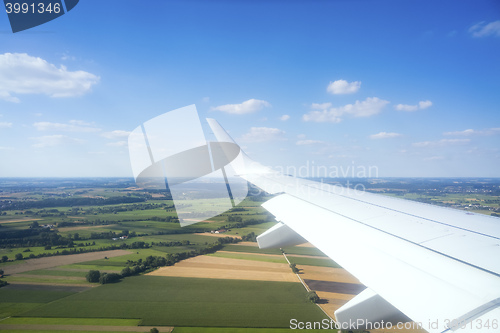 Image of view thru an airplane window