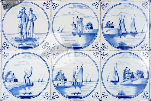Image of six typical blue delft tiles